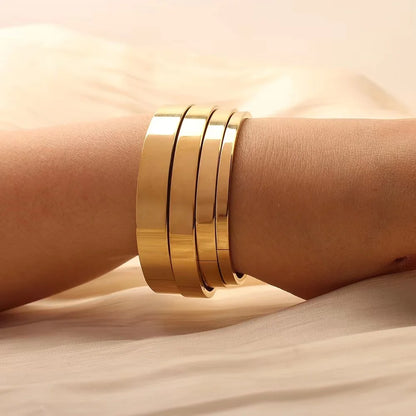 Minimalist Gold-Tone Stainless Steel Bangle Bracelet – Waterproof Oval Design for Women