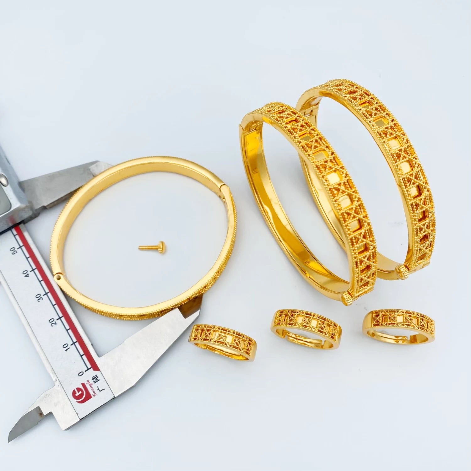 Gold Plated Hollow Jewellery Set with Bangles and Rings for Women – Elegant Gift for Parties & Special Occasions